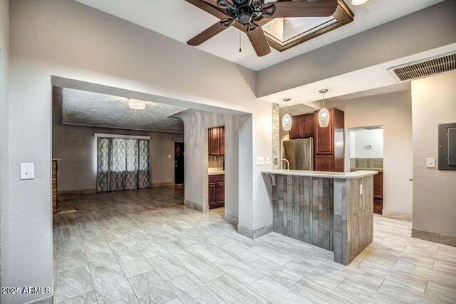2534 N 52nd St, Phoenix, AZ 85008 - kitchen featuring light countertops, visible vents, a ceiling fan, freestanding refrigerator, and hanging light fixtures