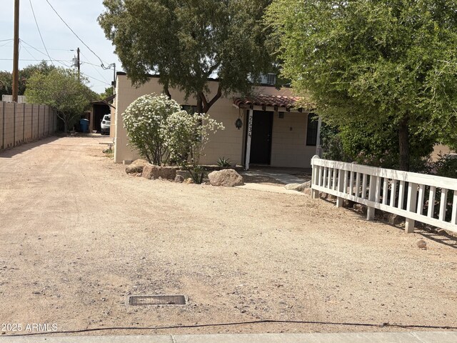 2534 N 52nd St, Phoenix, AZ 85008 - view of front facade featuring fence