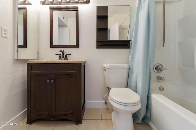 full bathroom featuring toilet, vanity, tile patterned floors, and baseboards
