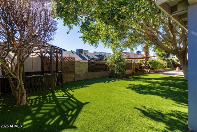 view of yard with a gazebo and central AC unit