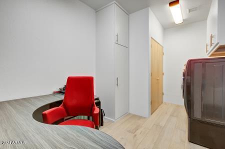 living area with light hardwood / wood-style flooring