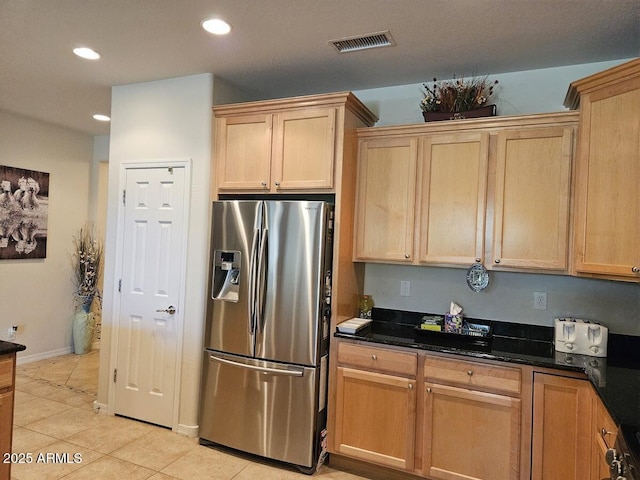 kitchen featuring visible vents, stainless steel fridge, light brown cabinets, recessed lighting, and light tile patterned flooring