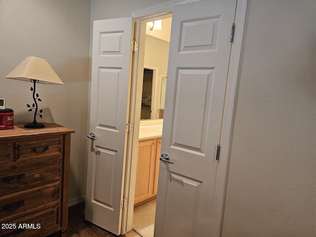 hallway featuring wood finished floors