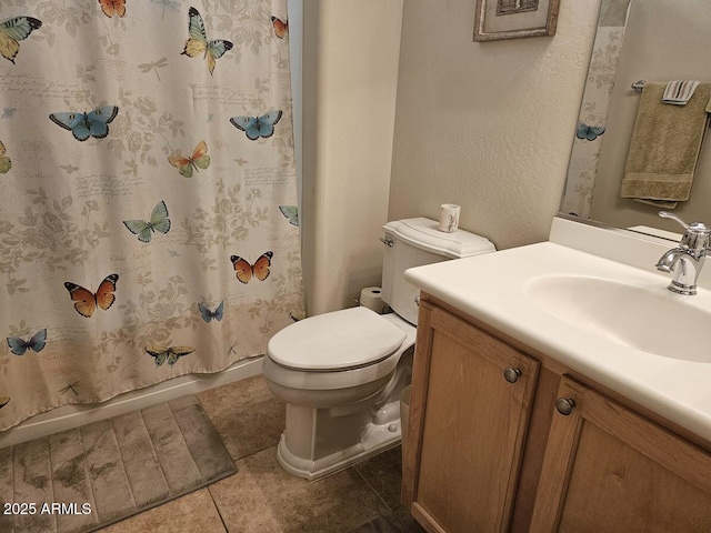 full bathroom featuring vanity, tile patterned flooring, shower / bath combination with curtain, and toilet