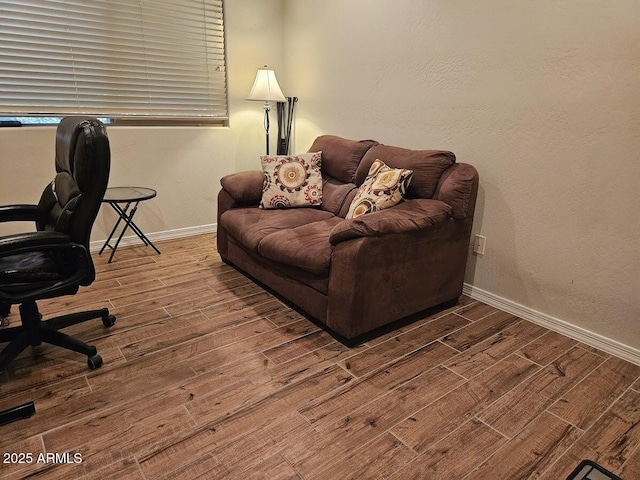 office featuring baseboards and wood finished floors