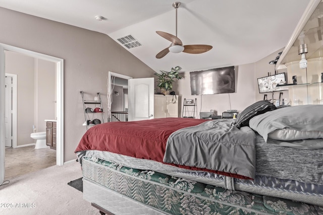 bedroom featuring visible vents, ensuite bathroom, carpet, baseboards, and vaulted ceiling