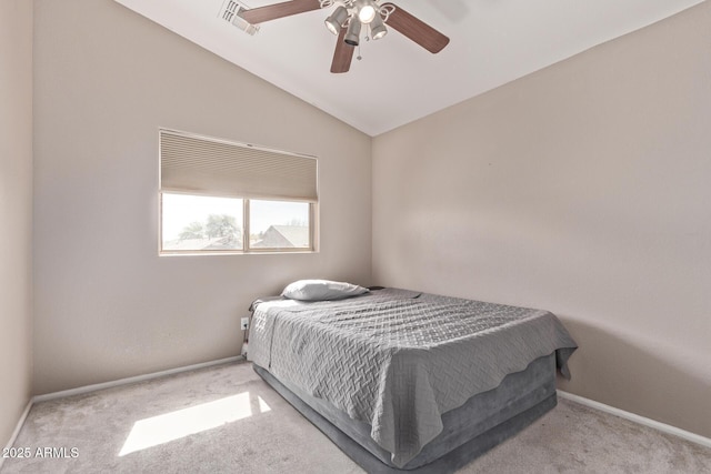 bedroom featuring visible vents, baseboards, carpet, and lofted ceiling