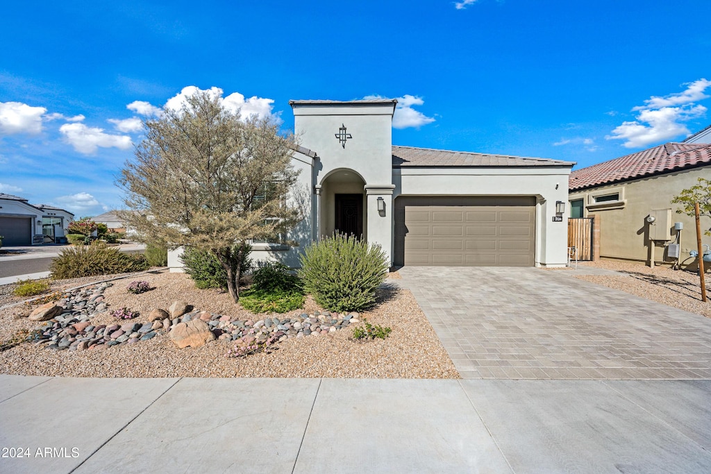 view of front of property featuring a garage