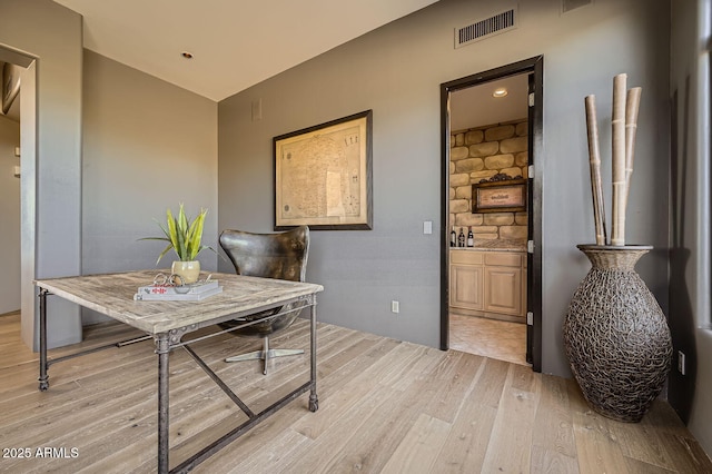 dining space featuring light hardwood / wood-style flooring