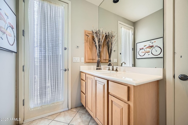 bathroom featuring tile patterned floors and vanity