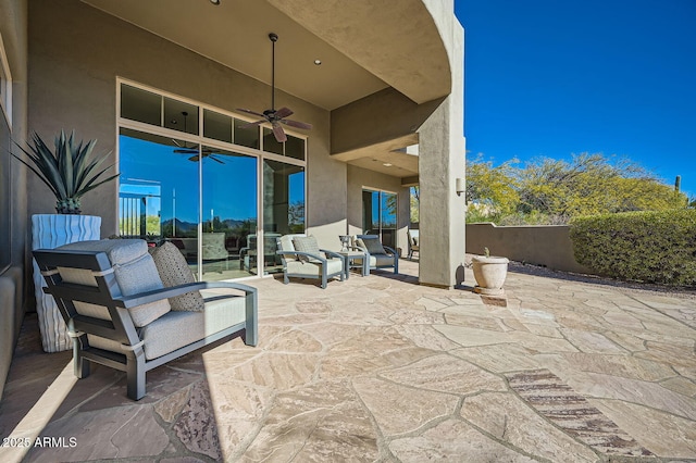 view of patio with ceiling fan