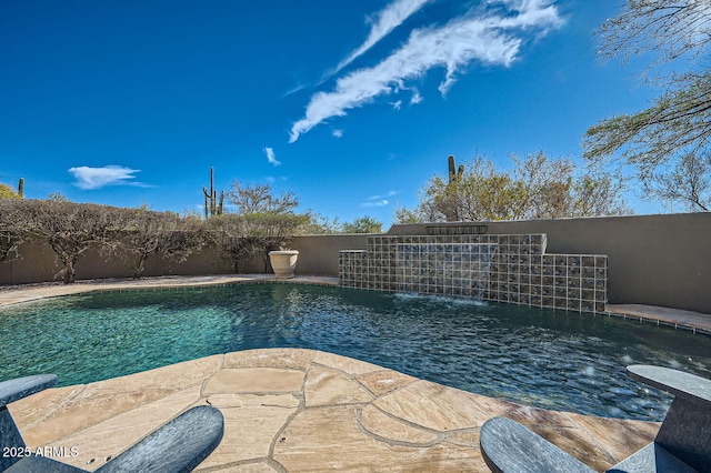 view of pool featuring pool water feature