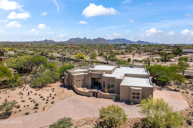 8300 E Dixileta Dr Unit 281, Scottsdale, AZ 85266 - view of front of home featuring stucco siding, a mountain view, and fence private yard