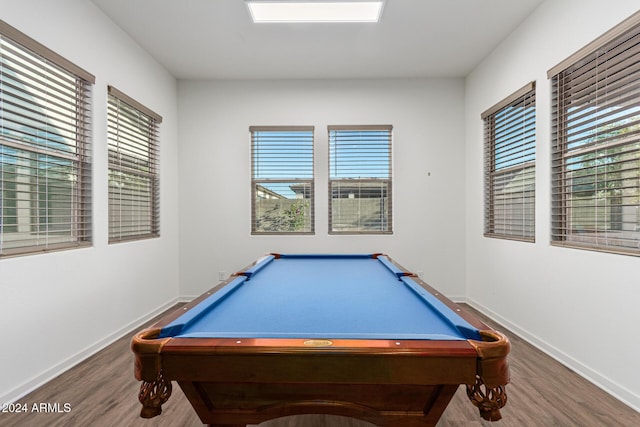 game room with dark hardwood / wood-style flooring, a healthy amount of sunlight, and pool table