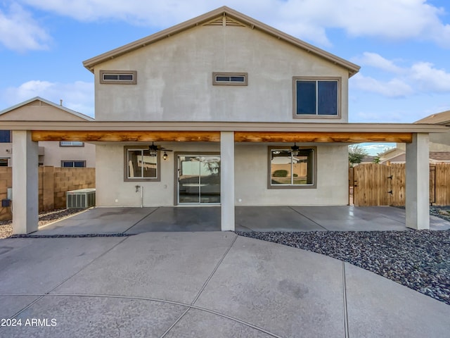 back of house featuring a patio, ceiling fan, and central air condition unit