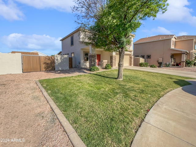 view of front of home featuring a front yard