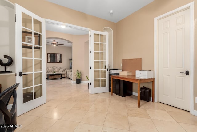 13336 W Via Caballo Blanco, Peoria, AZ 85383 - tiled home office with arched walkways, ceiling fan, and french doors