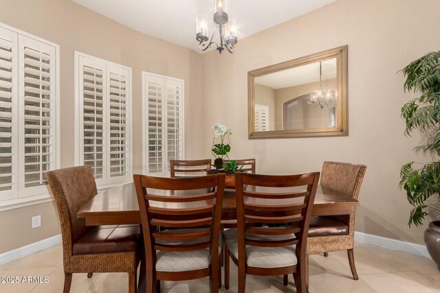 13336 W Via Caballo Blanco, Peoria, AZ 85383 - dining room featuring baseboards, a notable chandelier, and light tile patterned floors