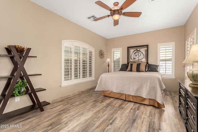 13336 W Via Caballo Blanco, Peoria, AZ 85383 - bedroom featuring wood finished floors and visible vents