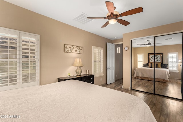 13336 W Via Caballo Blanco, Peoria, AZ 85383 - bedroom featuring a closet, wood finished floors, visible vents, and ceiling fan