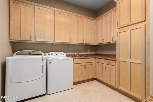 13336 W Via Caballo Blanco, Peoria, AZ 85383 - laundry area featuring light tile patterned floors, cabinet space, washer and clothes dryer, and a sink