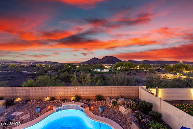 13336 W Via Caballo Blanco, Peoria, AZ 85383 - view of pool featuring a fenced in pool, a fenced backyard, and a mountain view