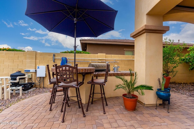 13336 W Via Caballo Blanco, Peoria, AZ 85383 - view of patio featuring fence and outdoor dry bar