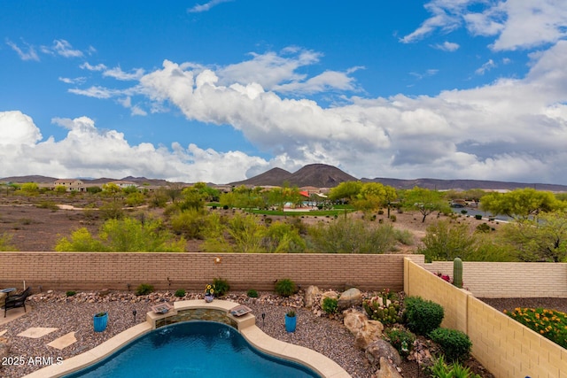 13336 W Via Caballo Blanco, Peoria, AZ 85383 - view of pool with a fenced backyard, a fenced in pool, and a mountain view