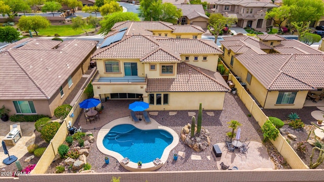 13336 W Via Caballo Blanco, Peoria, AZ 85383 - view of pool featuring a residential view, a patio, a fenced backyard, and outdoor dining area