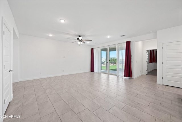 spare room featuring ceiling fan