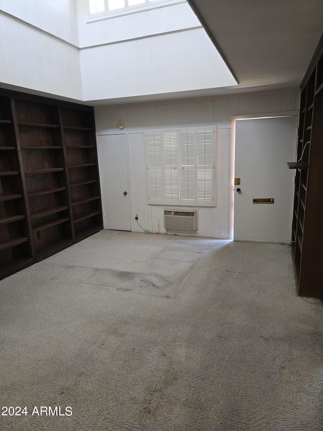 garage with an AC wall unit