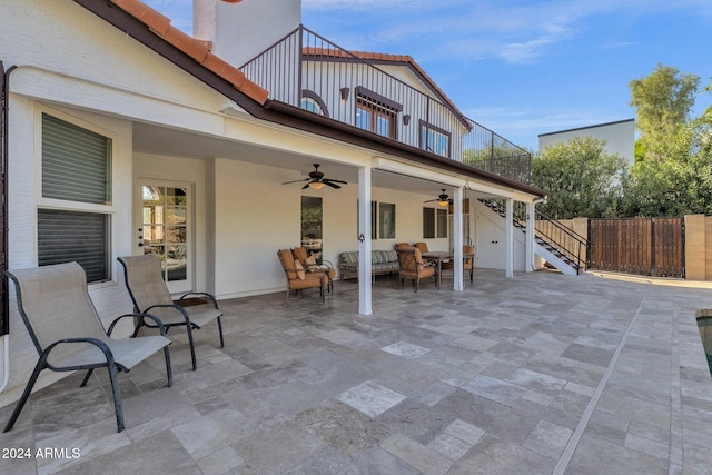 view of patio featuring ceiling fan