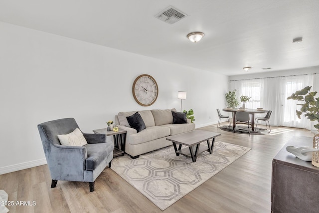 living room with light wood-type flooring