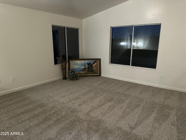 empty room with carpet flooring