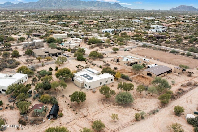 birds eye view of property featuring a mountain view