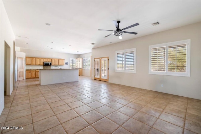 14428 E Monument Dr, Scottsdale, AZ 85262 - unfurnished living room featuring a ceiling fan, visible vents, and french doors