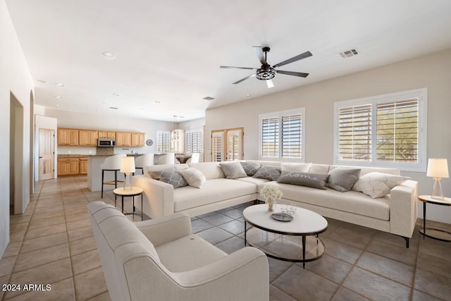 14428 E Monument Dr, Scottsdale, AZ 85262 - living room featuring built in shelves and visible vents