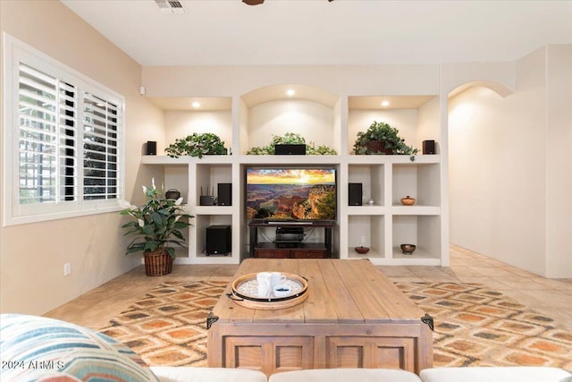 14428 E Monument Dr, Scottsdale, AZ 85262 - kitchen featuring a sink, a kitchen island with sink, light brown cabinets, and stainless steel appliances
