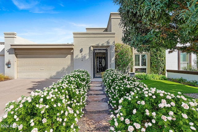 view of front of property featuring a garage