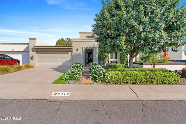 view of front of home with a garage