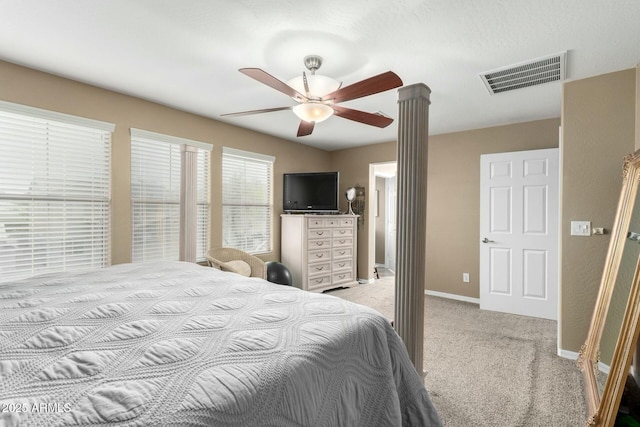 bedroom featuring baseboards, visible vents, carpet, and ceiling fan