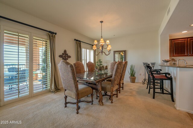 19700 N 76th St Unit 2001, Scottsdale, AZ 85255 - dining space with an inviting chandelier, recessed lighting, light carpet, and visible vents
