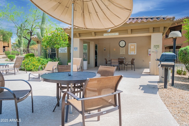 19700 N 76th St Unit 2001, Scottsdale, AZ 85255 - view of patio featuring outdoor dining space, grilling area, and fence