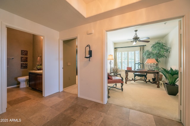 19700 N 76th St Unit 2001, Scottsdale, AZ 85255 - hallway with light carpet and baseboards