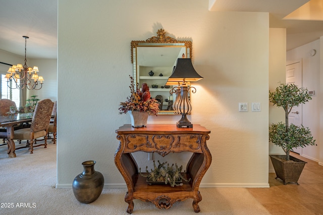 19700 N 76th St Unit 2001, Scottsdale, AZ 85255 - hall with carpet, baseboards, and a chandelier