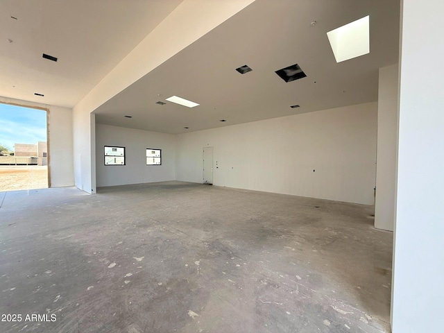 unfurnished room featuring plenty of natural light