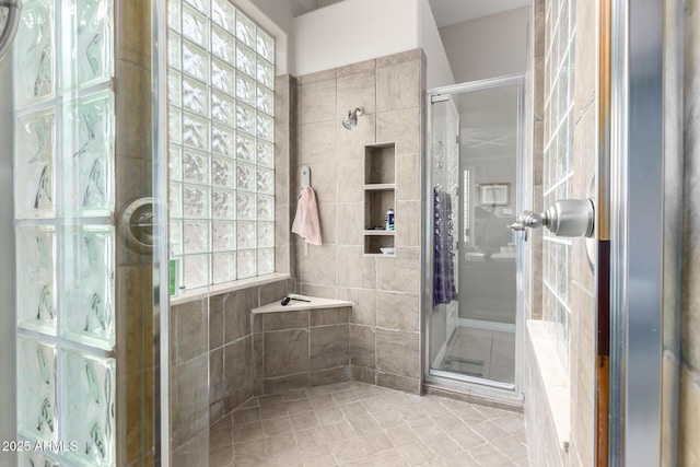 bathroom featuring a shower stall