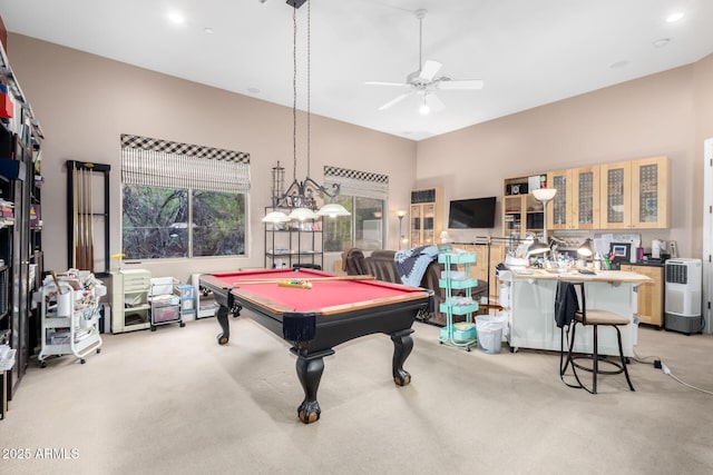 rec room with light carpet, ceiling fan, and pool table