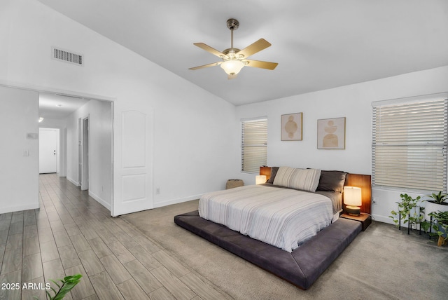 10226 W Country Club Trl, Peoria, AZ 85383 - bedroom featuring baseboards, wood finished floors, a ceiling fan, and high vaulted ceiling