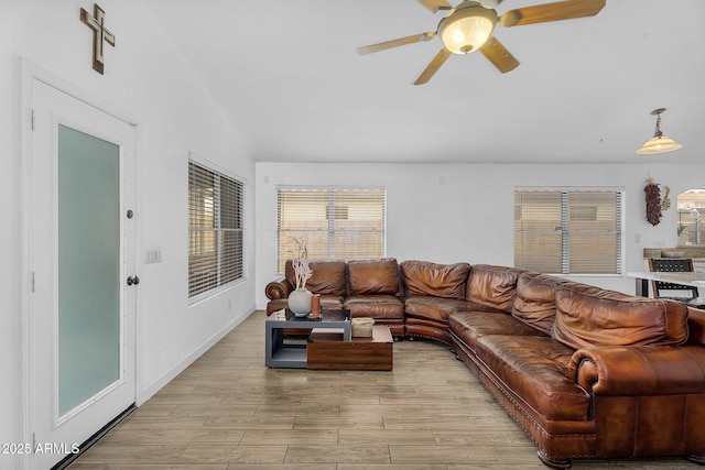 10226 W Country Club Trl, Peoria, AZ 85383 - living room with a ceiling fan, light wood finished floors, and lofted ceiling